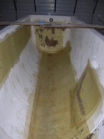 Tank with fresh fiberglass installed