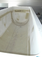 Tank fiberglass sanded down and prepped for gel coat
